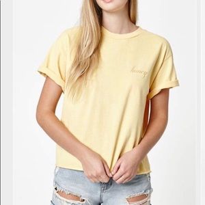 yellow “honey” shirt